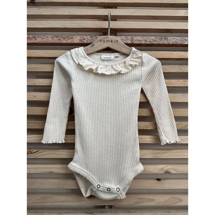 Pre‑Loved Langarm-Body von Lil’ Atelier | Grösse: 86