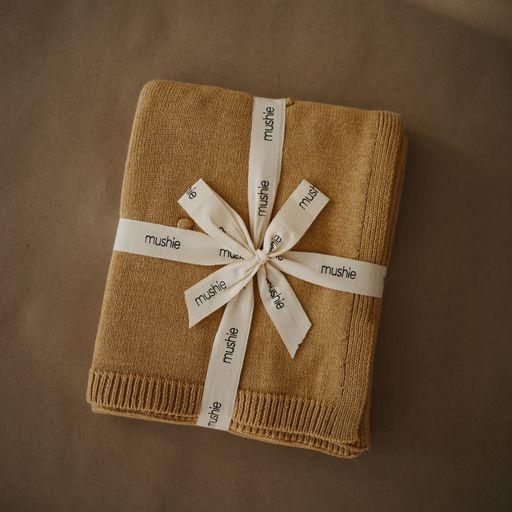 Mushie gestrickte Babydecke - Textured Dots Mustard Melange