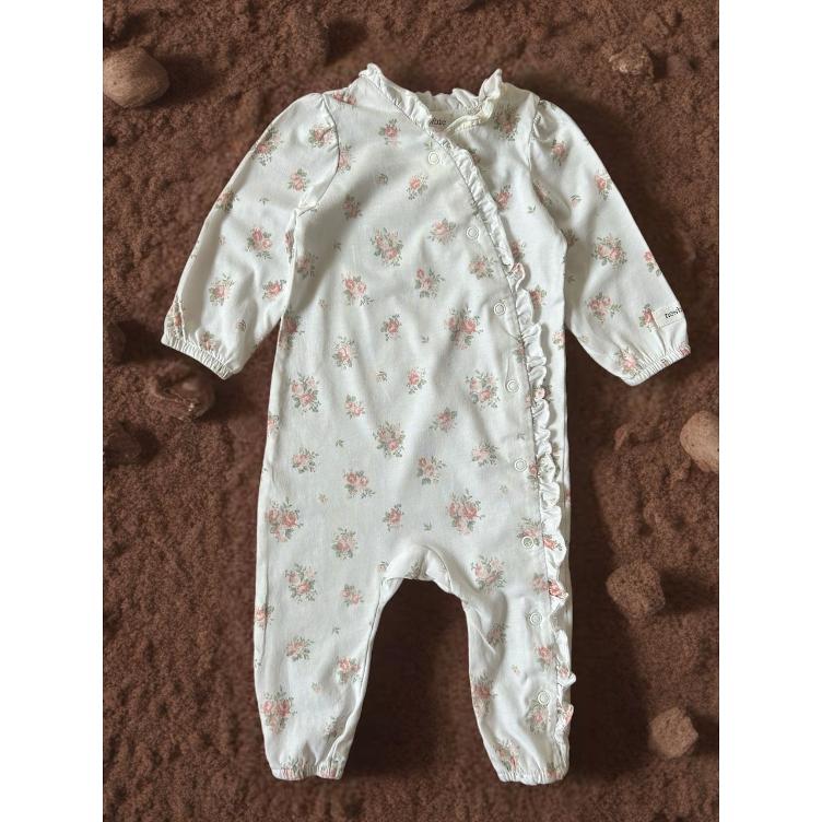 Pre-Loved Strampler von Newbie | Weiss mit floralem Print | Grösse: 62